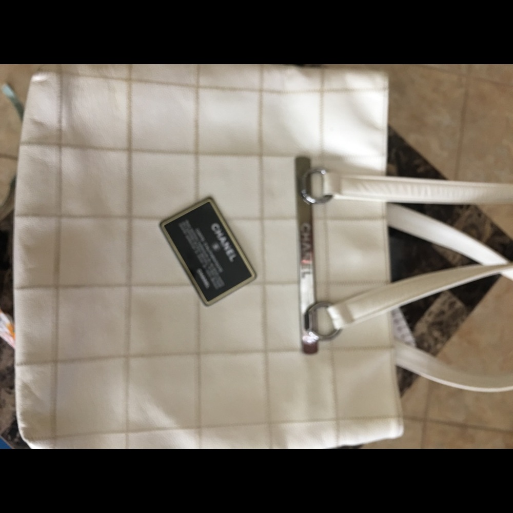 Authentic Cream color Chanel purse.